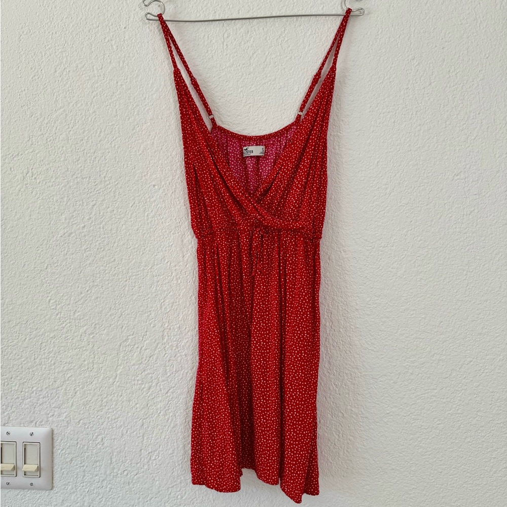 Hollister wrapped-front red mini dress with small white polka dots